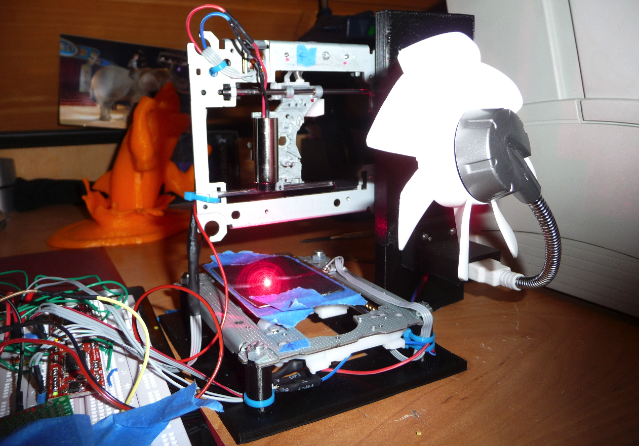 16-Year-Old Creates a Working Laser Engraver From 2 DVD Drives & 3D