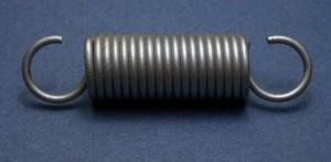 Tension coil spring.