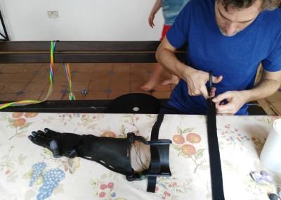 Joe Cross preparing a prosthetic.