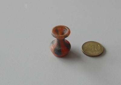 Tiny vase is small.