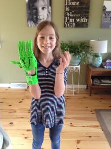 Sierra showing off the Cyborg Beast hand that she put together – 3duniverse.org