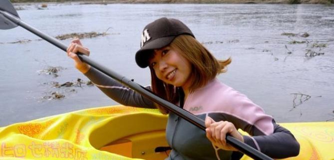 Igarashi paddling in her vagina shaped kayak