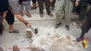 ISIS destroying a 3,000 year old statue