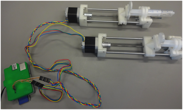 Two of Pearce Research Group's 3D printed pumps hooked up to motors and a Raspberry Pi. Source: PLOS One
