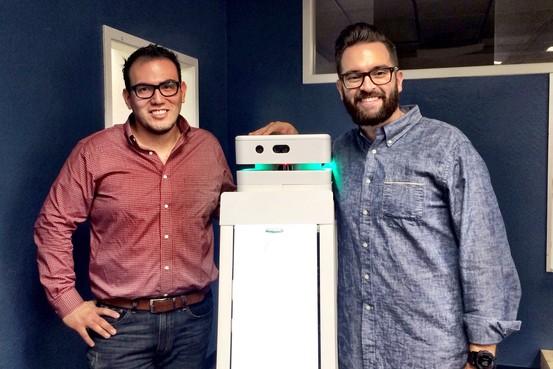 Marco Mascorro, CEO of Fellow Robots, left, and Kyle Nel, executive director of Lowe’s Innovation Labs
