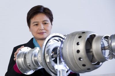 Professor Xinhua Wu with a 3D printed small jet engine