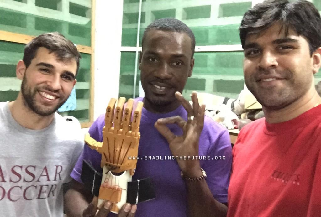 Dante, Joel, and Mohit with Haiti’s first Raptor hand