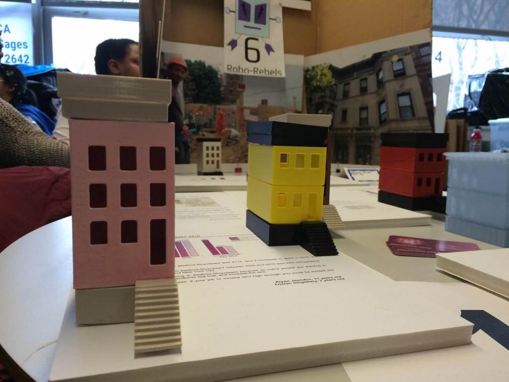 The DIVAS for Social Justice team displayed models of brownstone homes that they created using a 3D printer. (Photo by Zach Crizer, Technical.ly Brooklyn) 