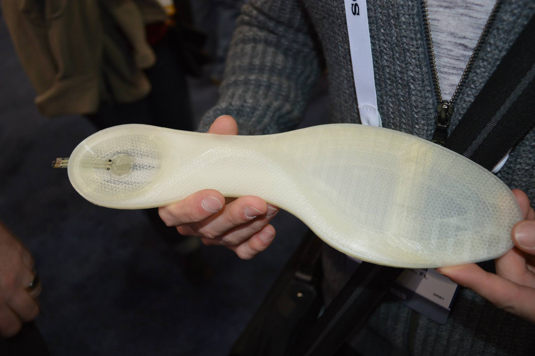 A shoe sole 3D printed with an embedded pressure sensor.