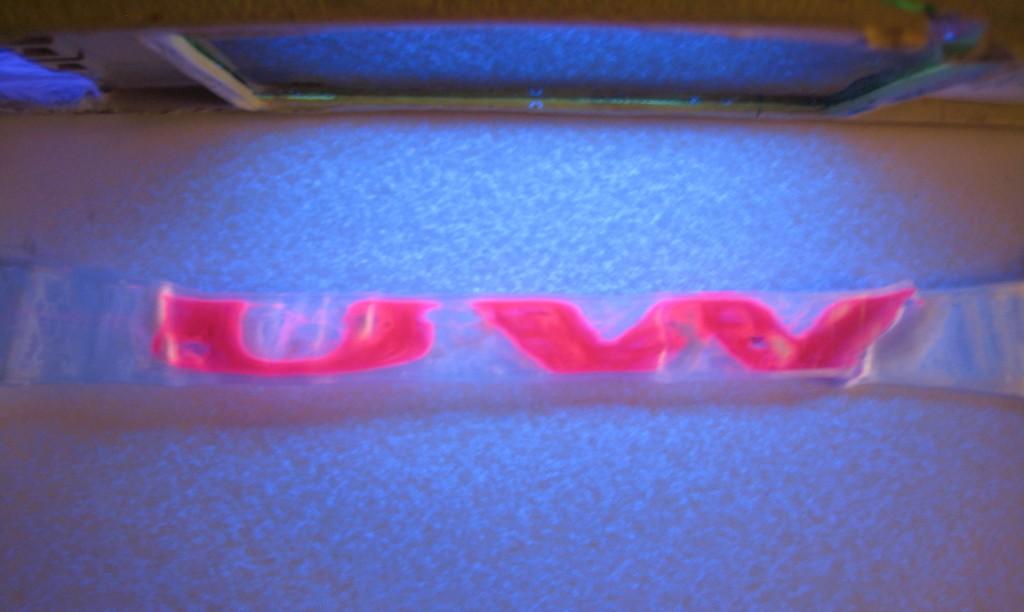 molecules glowing under UV light