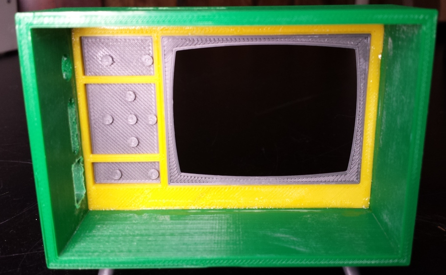 The inside of the TV case has small nubs that operate the media player when pressed.