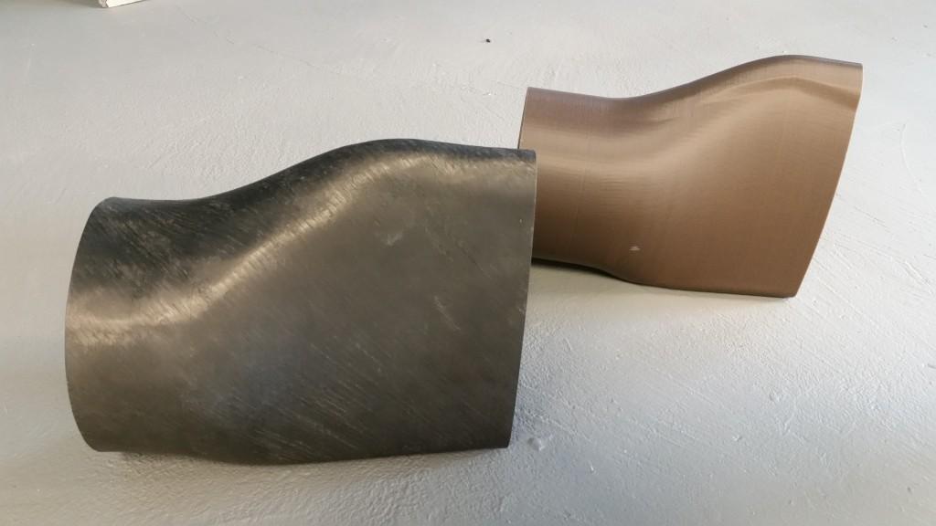 Automated Dynamics used FDM soluble cores in brown in background to develop a 4ft helicopter blade, reducing tooling costs by 60-70