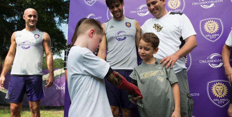 Orlando City Soccer Team Presents 6-Year-Old Brazilian Boy with a 3D Printed Bionic Arm from Limbitless Solutions