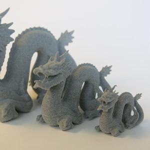 3D-printed-dragons-in-grey-plastic-with-SLS-technology