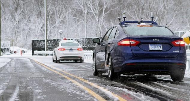 A Ford autonomous vehicle successfully being tested in snowy conditions. 
