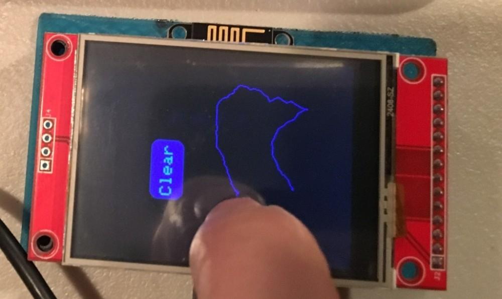 An Arduino compatible, WiFi-connected color touchscreen device made with 3D printed circuits.