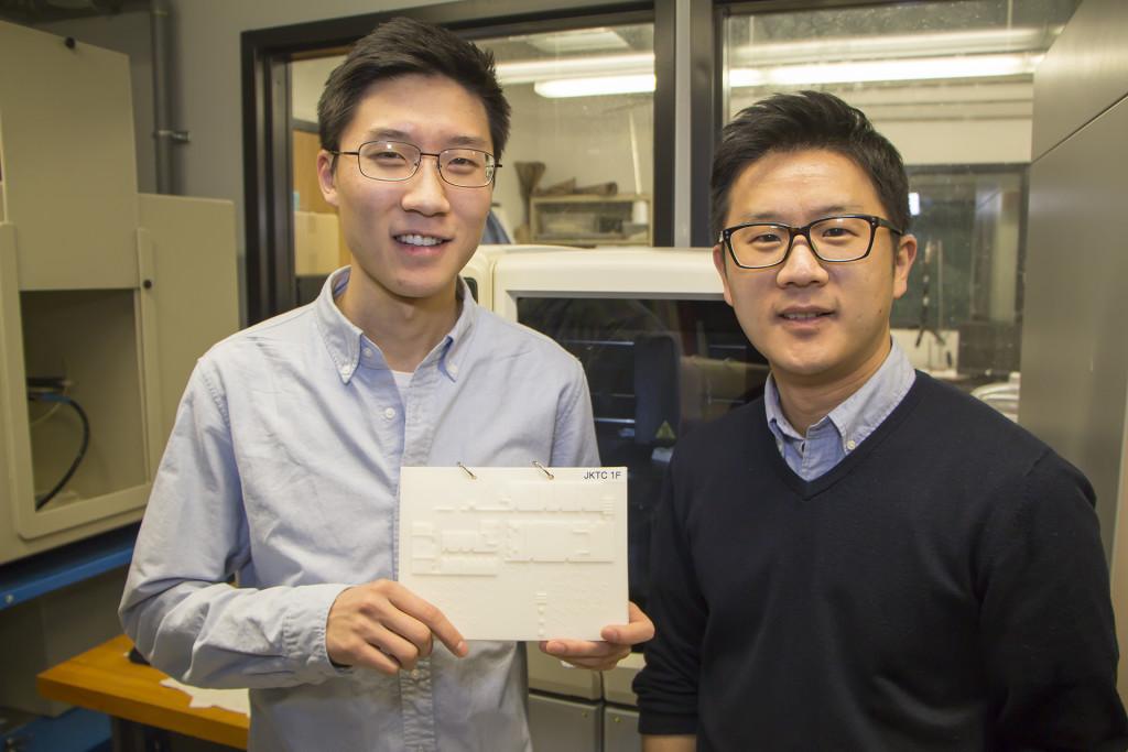 Photo: Cameron Bowman Engineering student Jason Kim and Howon Lee, assistant professor in Rutgers' Department of Mechanical and Aerospace Engineering, with a 3D-printed tactile map with braille.