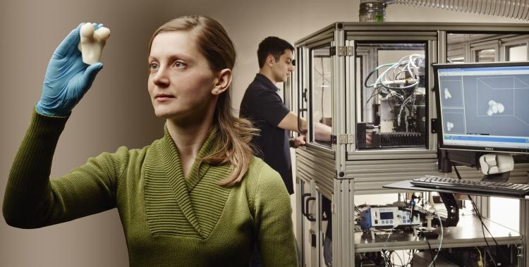 Mihaela Vlasea and her bone implant 3D printer. 