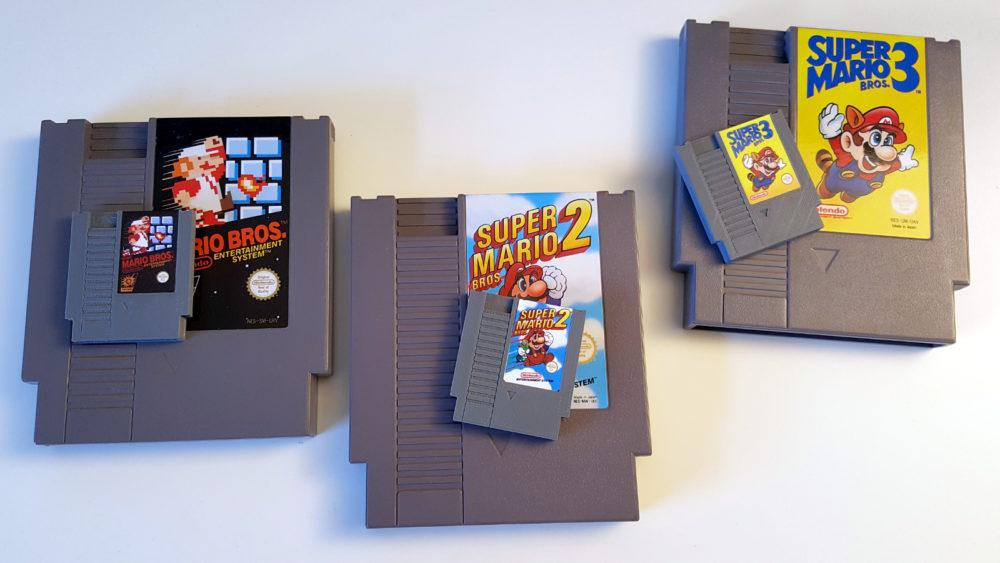 The original game cartridges and their mini versions. 