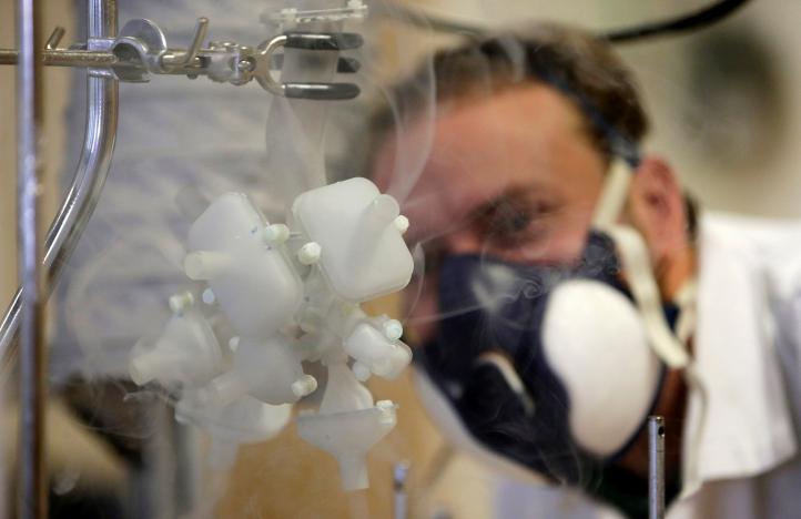 Scientist Frantisek Lizal looks at a model of a functioning human lung that can be used to simulate chronic diseases and their treatments in the Brno University of Technology in Brno, Czech Republic, November 22, 2016. Picture taken November 22, 2016. REUTERS/David W Cerny