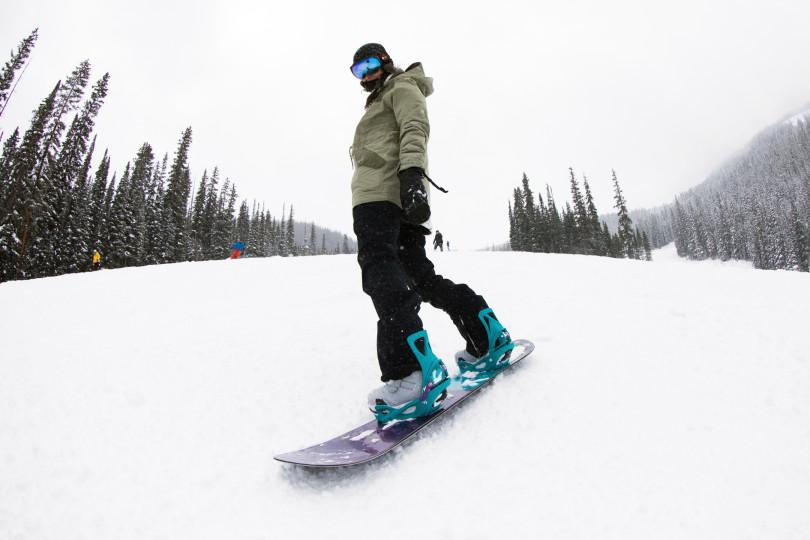 In this photo provided by Burton Snowboards, a person snowboards using the new Step-On bindings in Vail, Colo., Wednesday, Dec. 14, 2016. A new technology that enables the boot to snap onto the board like a ski binding has the potential to inject fresh life into a sport that has been dealing with slowing growth for the last decade or so. (Gabe L'Heureux/Burton Snowboards via AP)
