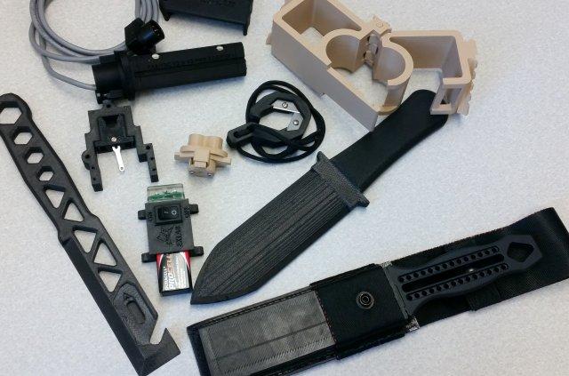 These parts were made using additive manufacturing, which creates plastic items and other durable components by adding material, layer by layer, using 3-D printers. [Image: US Army]