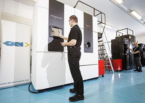 Staff with the new Arcam Q20 Additive Manufacturing machine at GKN Aerospace, Filton.