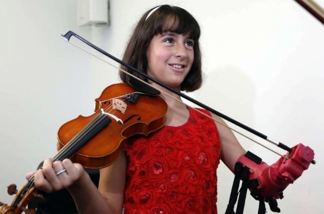 Pretty in Pink: Young Violinist Relies on New 3D Printed Prosthetic