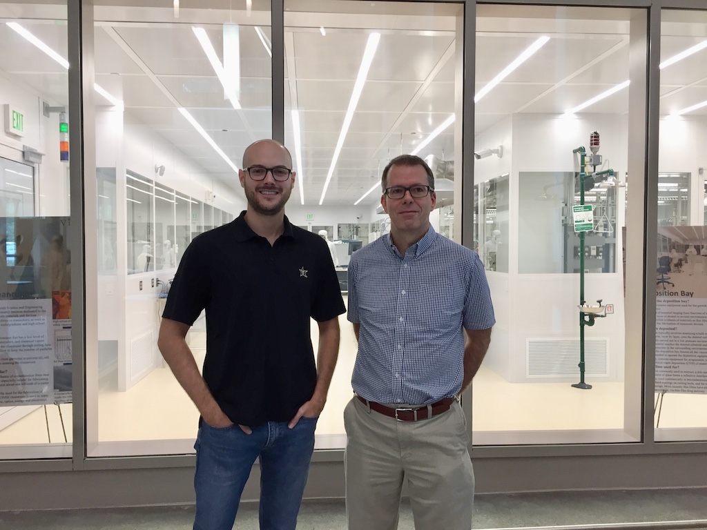 On the left researcher Cole Brubaker stands next to his Phd advisor Kane Jennins.