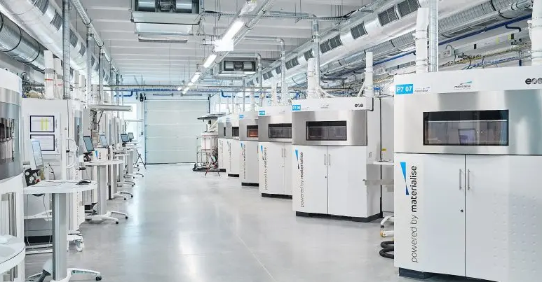 Materialise facility with dozens of 3D printers.