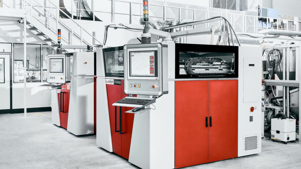 voxeljet V1000 printers in a 3D printing facility.
