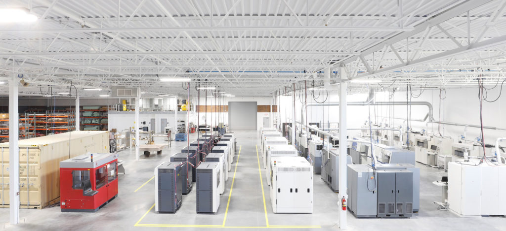 Fathom's manufacturing facility filled with 3D printing platforms.