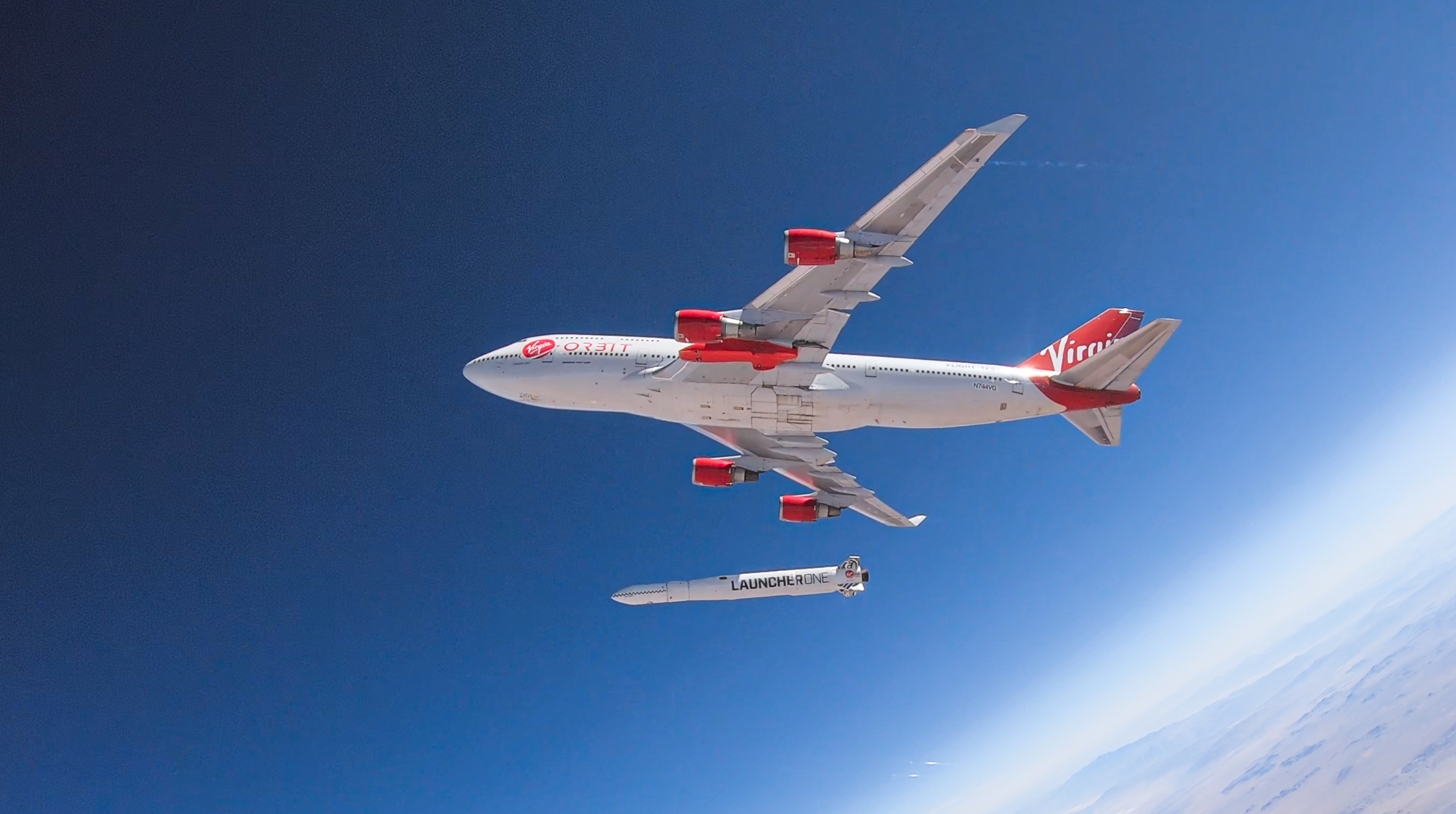 Virgin Orbit's Boeing plane Cosmic Girl releases the LauncherOne rocket mid-air.