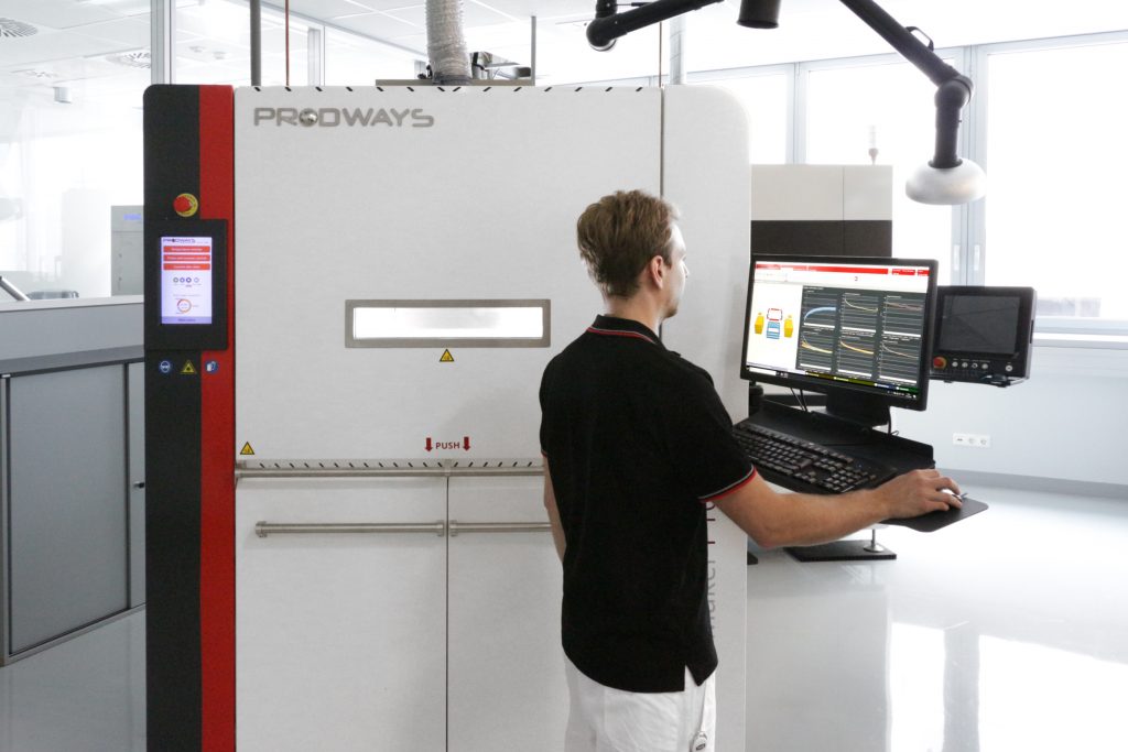 Engineer working with Prodways' 3D printing system.