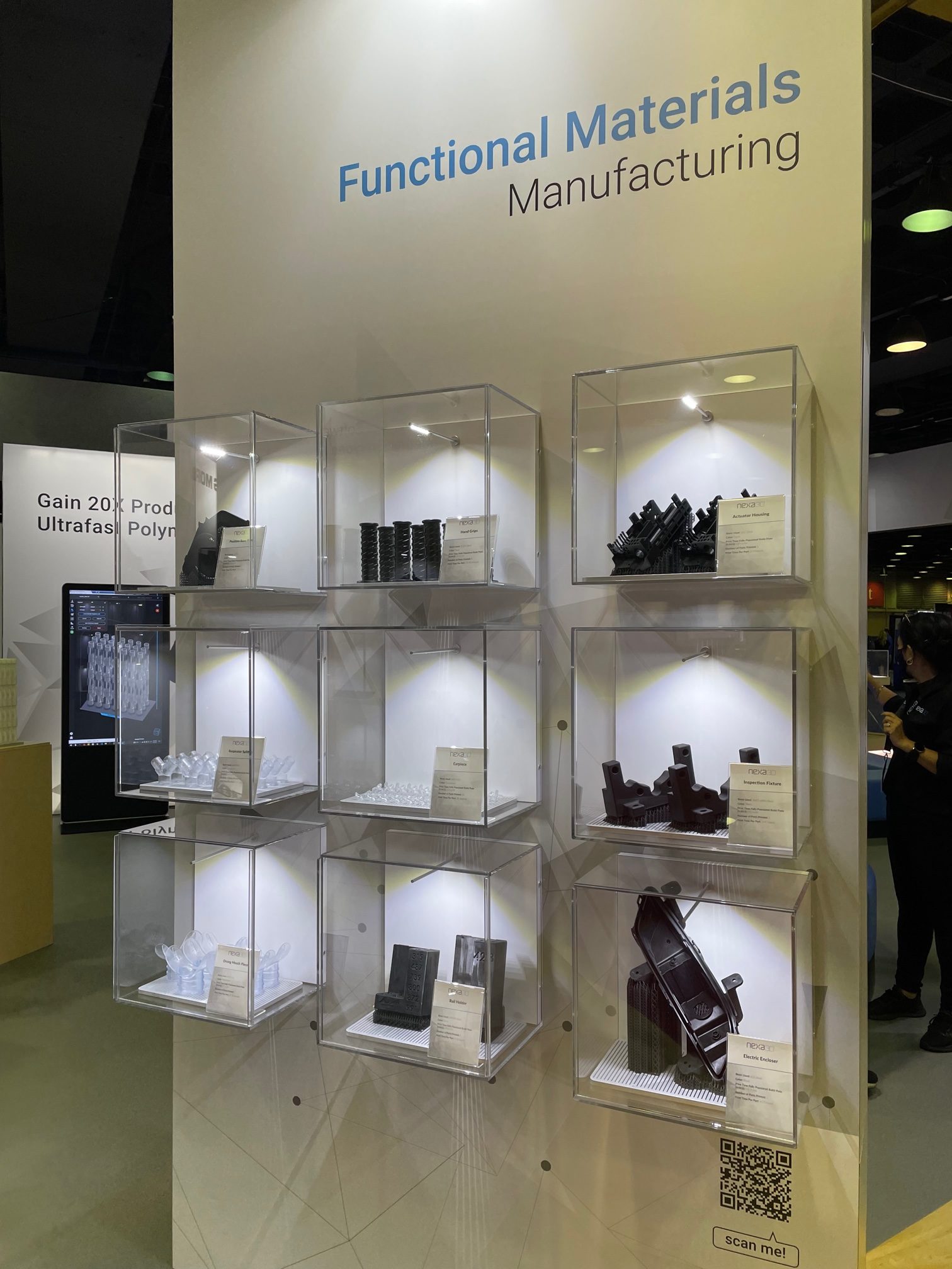 Functional parts 3D printed in different materials showcased at Nexa3D's booth at RAPID + TCT 2021