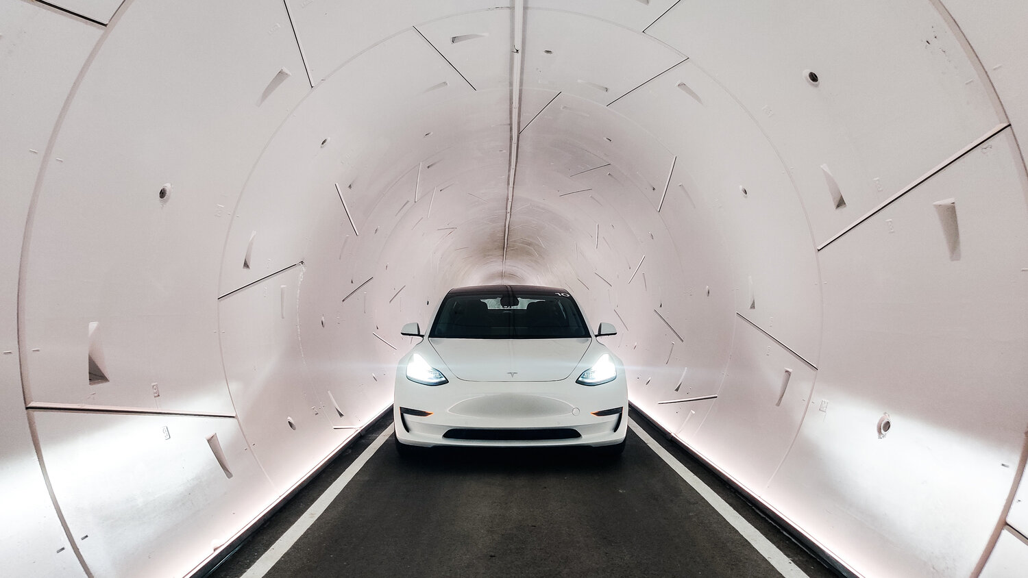 A Tesla car driving through the Vegas Loop, a hyperloop system in Las Vegas.