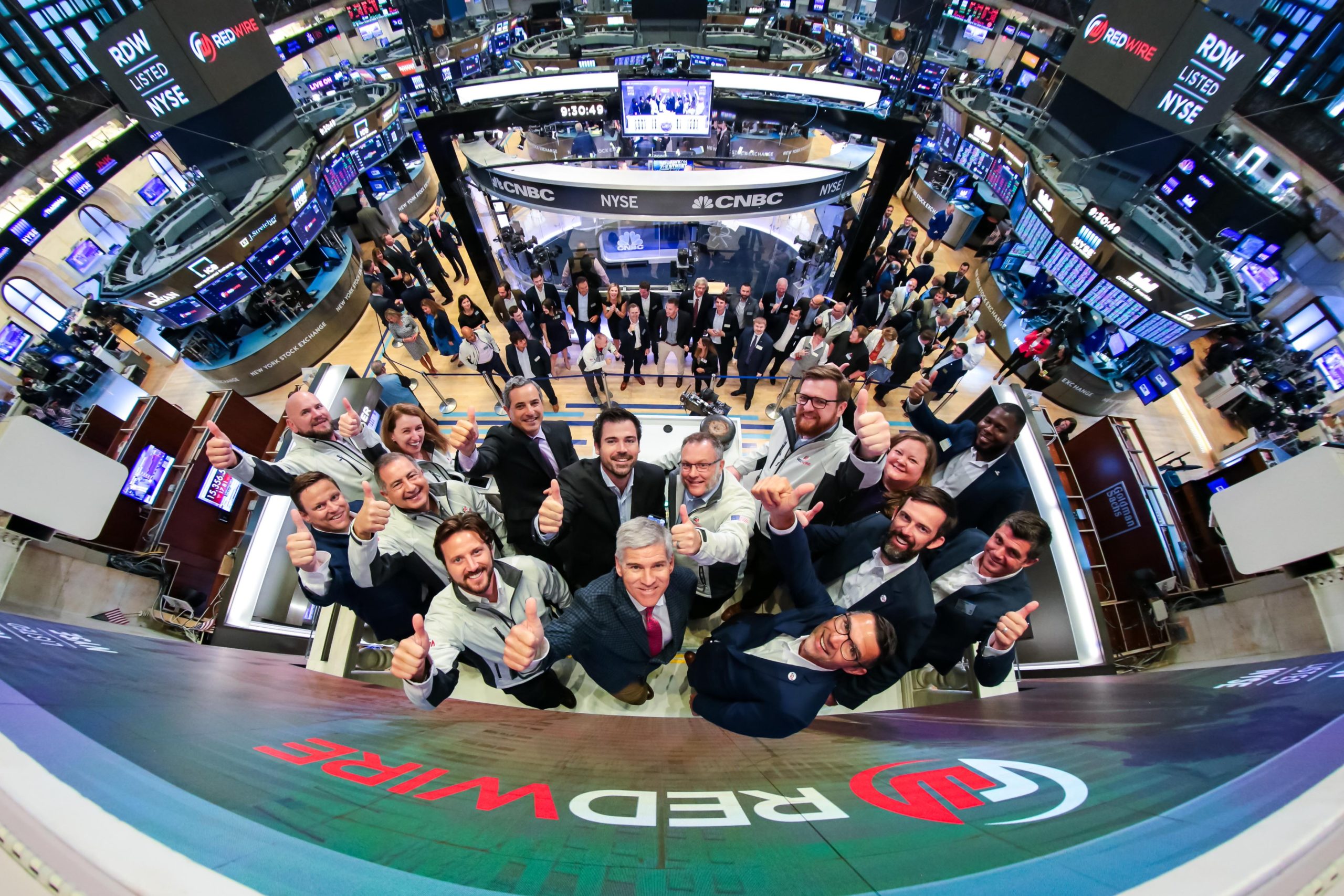 Redwire team rings opening bell at the NYSE as company goes public.