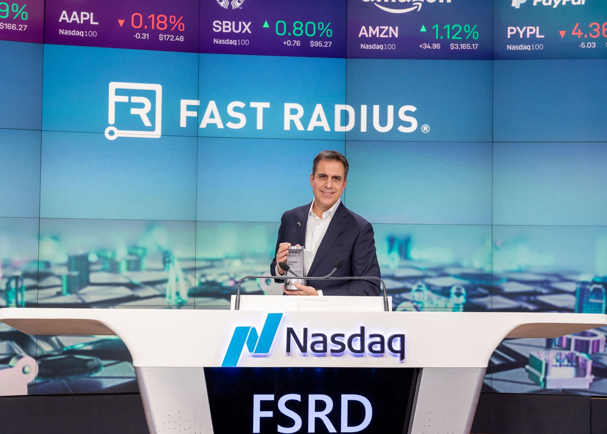 Fast Radius co-founder and CEO Lou Rassey rings Nasdaq bell.