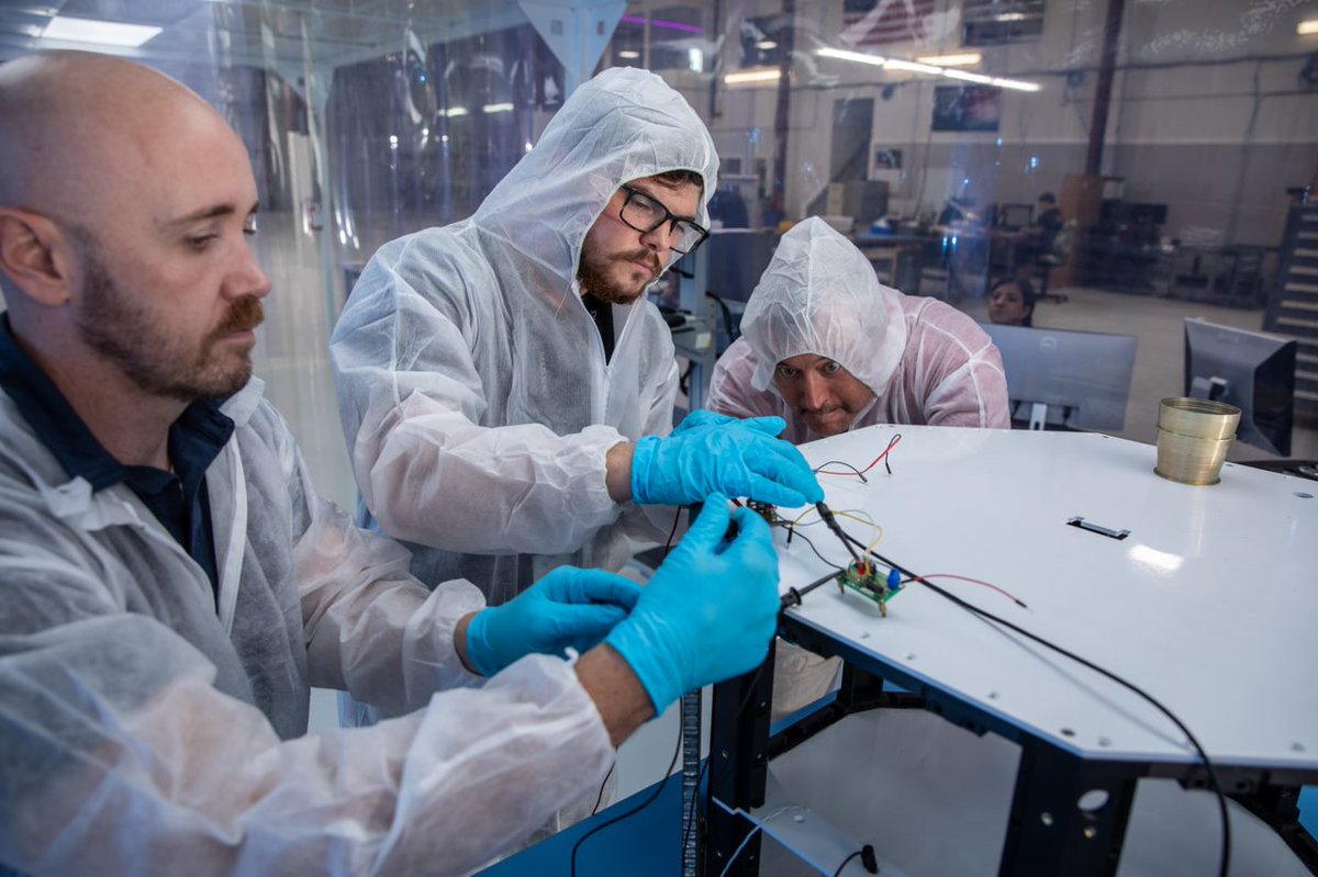 Engineers working on Sidus Space's LizzieSat