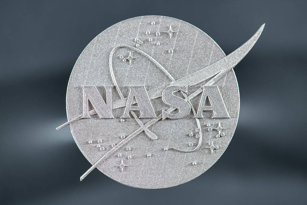 Macro Photographs of 3D Print of NASA logo made out of 3D printable new alloy GRX-810. 
